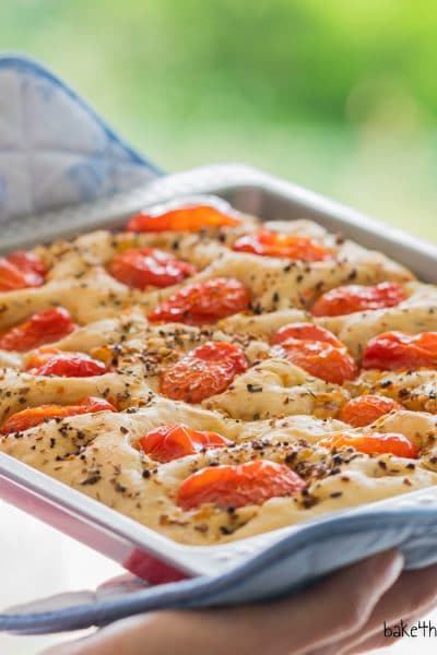 Focaccia with Mediterranean herbs and tomatoes