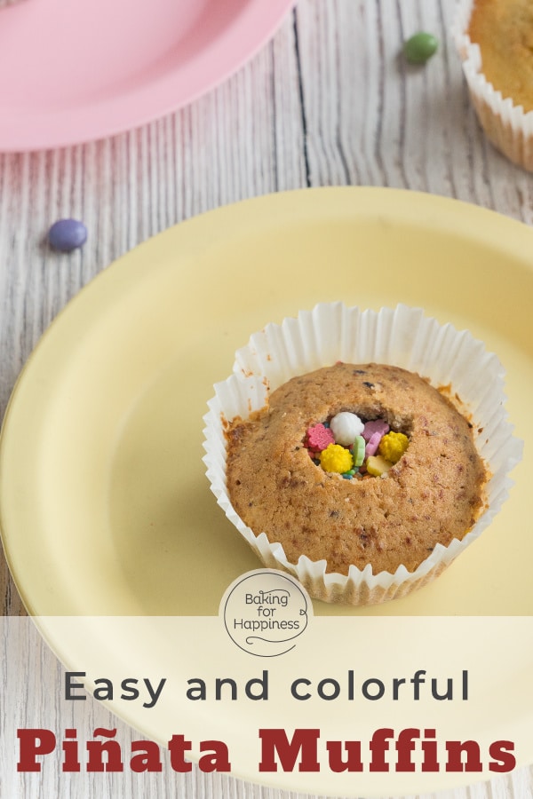 These piñata muffins with smarties are eye-catchers for any celebration! The perfect children's birthday cupcakes filled with treats!