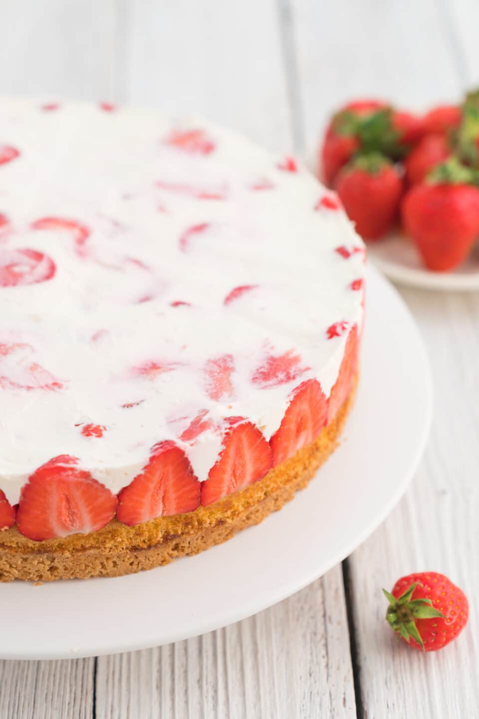 strawberry cake with cream and a double base