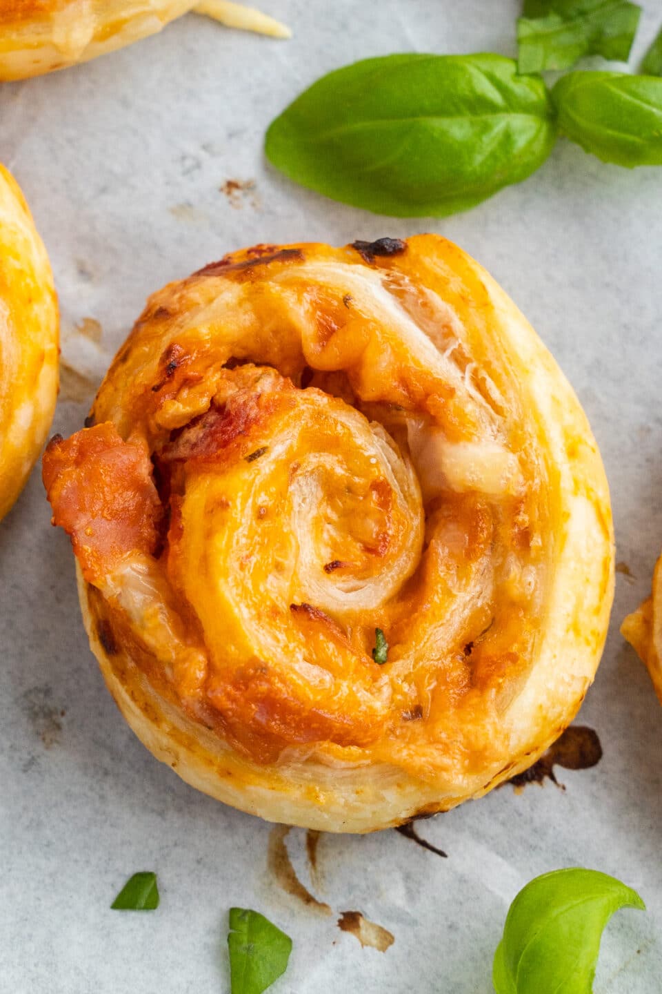 pizza bun with tomato sauce and veggies